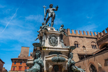 Perspective and detail of the Fountain of Neptune (Italian: Fontana di Nettuno) next Re Enzo palace, Bologna ITALY
