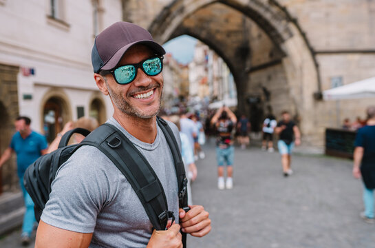 Tourist man smiling having holiday trip.