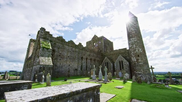 Rock of Cashel camera pushing past graveyard. Ireland