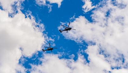 Helicopter tour. helicopter flying in the sky. two helicopter rotorcraft. police helicopter. heli copter flight
