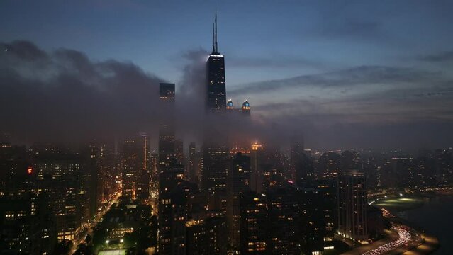 Chicago Ariel drone footage of the skyline at night time
