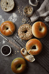 Whole wheat alkaline bread, donuts, oatmeal and grain decoration, healthy breakfast, wooden table background indoors