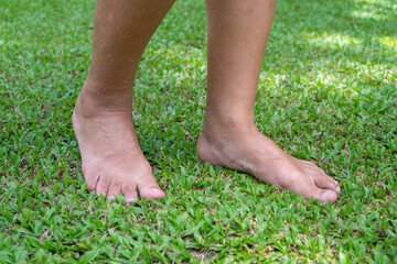 Walking barefoot on grass helps to stimulate the functioning of organs..