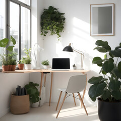 laptop on workplace with plant
