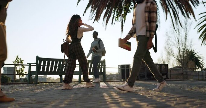 People, path walking and outdoor with morning commute and travel on a plaza and sidewalk. Traveling, step and students on concrete going to university, college and school class with sunrise on campus