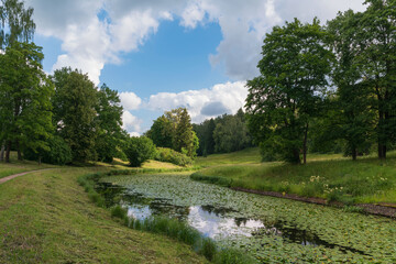 Slavyanka River Valley in the landscape part of the Pavlovsk Palace and Park Complex on a sunny...