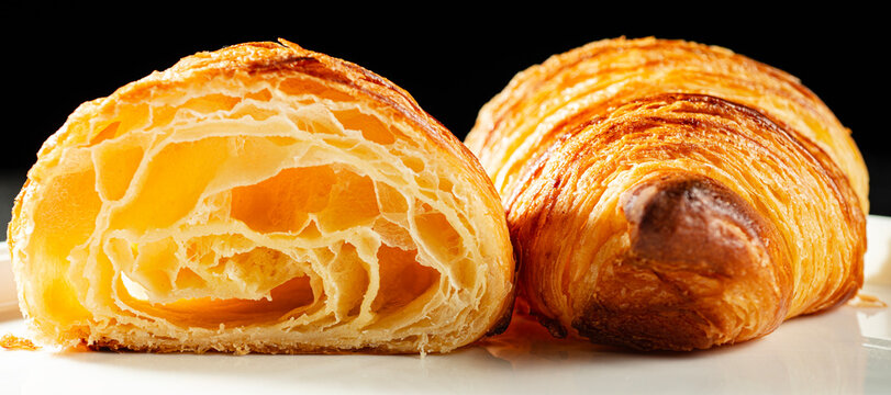 Delicious crispy, flaky, buttery plain 37-layer croissant with a beautiful honeycomb.