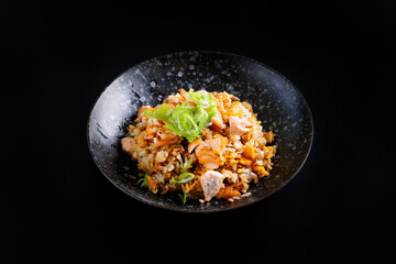 Japanese fried rice yakimeshi isolated in black background