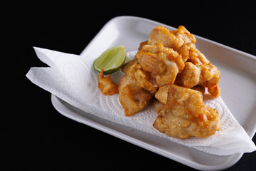 Chicken Karaage Japanese Fried chicken isolated in black background