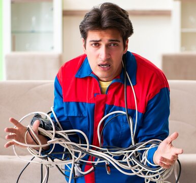 Electrician contractor with tangled cables