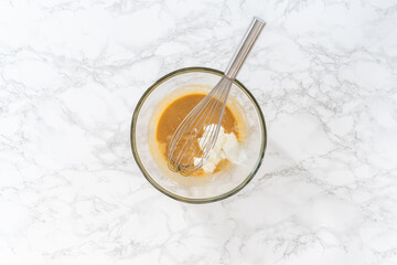 Lemon poppy seed muffins garnished with almond slivers