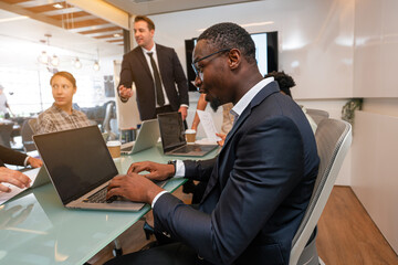 Group of professional business people are working and shaking hands while working in the creative office.