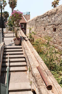 An old stone conduit on one of the quiet side streets near the main pedestrian HaMeyasdim in Zikhron Yaakov city in northern Israel