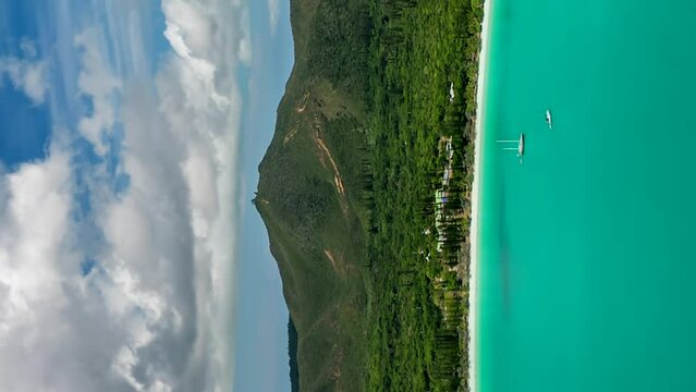 Vertical aerial hyperlapse over famous Kuto Beach, Isle of Pines. Dolly forward.