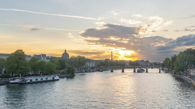 Time Lapse of Paris Sunset at River Seine from Pont Neuf: Captivating Skies over Historic Bridge, Nature Meets Architecture in France's Capital