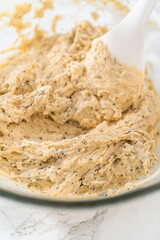 Lemon poppy seed muffins garnished with almond slivers