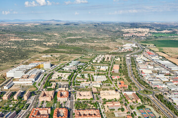 Vertical aerial image of the residential area of Toledo with the N 400 road separating it from the industrial zone