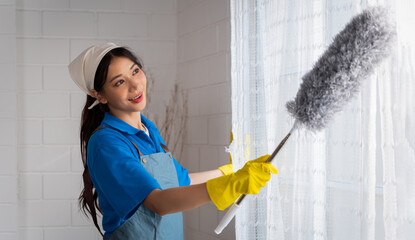 The housekeeping staff is using wood dusting and dusting curtains in the living room. Housekeeping...
