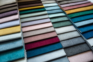 Catalog of new upholstery fabric samples on home sofa or renovation other