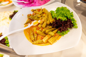 Fried zucchini flowers on a plate in a restaurant