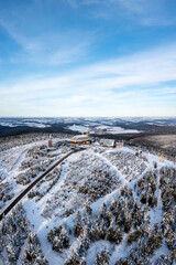 Fichtelberg highest mountain in Erzgebirge in winter aerial view photo portrait format in...