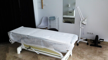 Treatment couch at physiotherapy clinic
