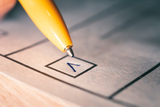 mark in the selection and a close-up pen. a checkbox for voting. Presidential or parliamentary elections in the country. The concept of choice.