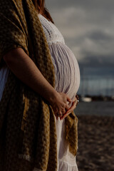 Pregnant maternity by the seaside
