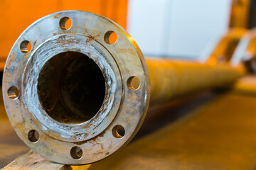 Severe corrosion of pipe flanges in the petroleum industry.