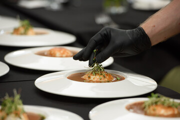 Tomato gazpacho soup served with burrata cheese. Tasty appetizing summer tomato soup