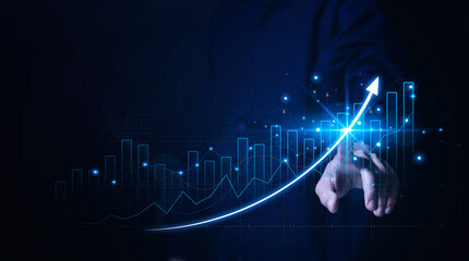 Businessman planning digital stock market analysis strategy Technology chart showing positive...