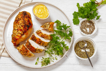Baked Split Chicken Breasts on plate, top view