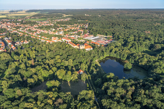Germany, Saxony-Anhalt, Ballenstedt, Aerial view of lake in front of Ballenstedt Castle