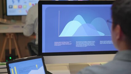 Asia people expert man tech talent night working late on predict sales insight SEO graph chart AI smart plan visual big data science report center BI tools screen. Office worker asian analyst job.