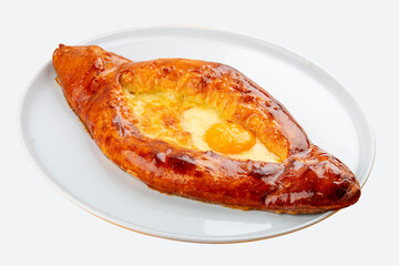 Adjar-style khachapuri with cheese, egg and butter. Caucasian cuisine. Isolated image on a gray background.