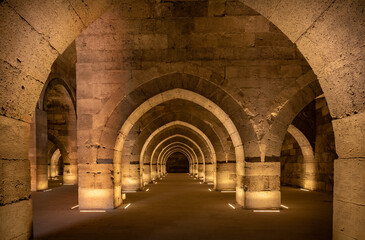 Interior of Sultanhani Caravanserai, an ancient fortified inn on the caravan route, Aksaray, Turkey. . - 644375471