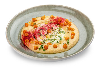 Chickpea hummus on a decorative ceramic plate. White background.