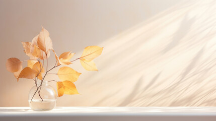 A captivating scene of a zen gentle light background with a touch of autumn. The golden light filters through colorful fallen leaves on a windowsill, casting a warm and cozy atmosphere.