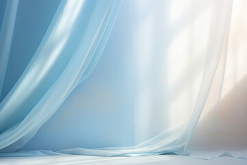 Fototapeta A soothing blue background with a soft, hazy light coming in through a , gauzy curtain. The resulting shadows are dreamlike and ethereal, setting a calm and relaxed mood for showcasing obraz