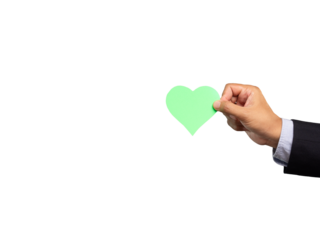 Close-up of hand a man holding a green heart symbol made from red paper while standing on a transparent background.