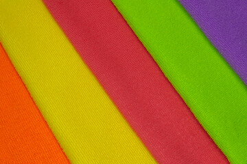 colored folded microfiber cleaning rags close up