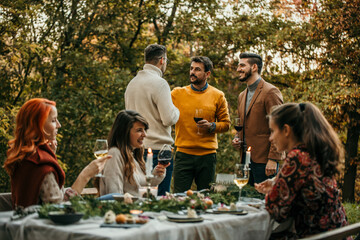 The essence of a memorable garden lunch, where friends come together to create cherished moments in a picturesque outdoor setting.