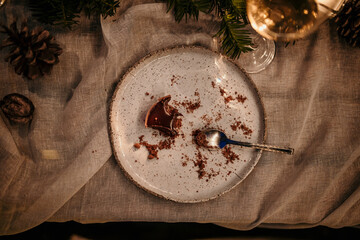 Desert leftovers on the plate after dinner.