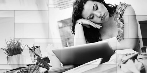 Overworked businesswoman sitting at a messy desk, geometric pattern