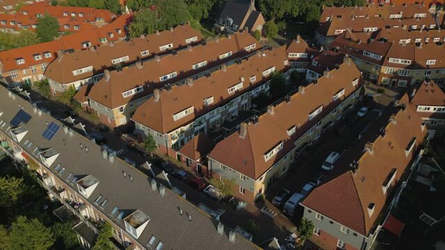 Top view of typical orange Dutch roofs and houses in residential neighborhood pt 4 of 4