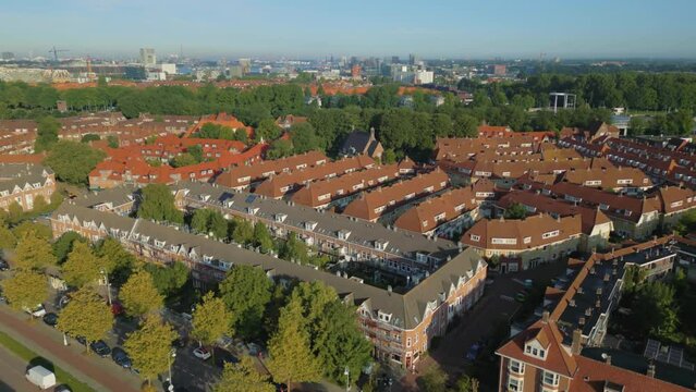 Aerial above Meeuwenlaan in Vogelbuurt Amsterdam Noord with center in background pt 1 of 4