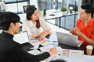 Male and female creative designer brainstorming for new interior design renovation projects at office