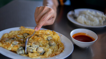Close up women eating seafood