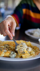 Close up women eating seafood
