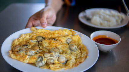 Close up women eating seafood